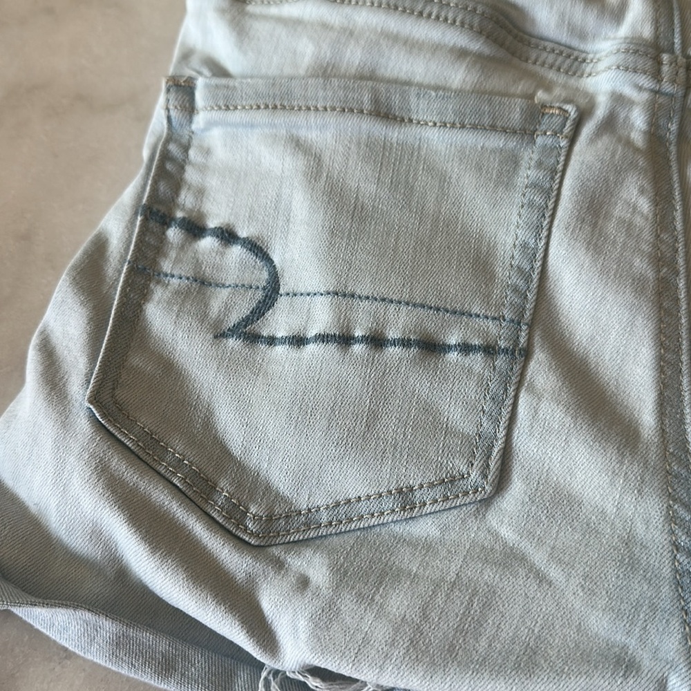 American Eagle Next Level Stretch Hi Rise Shortie Denim Shorts - Picture 10 of 12